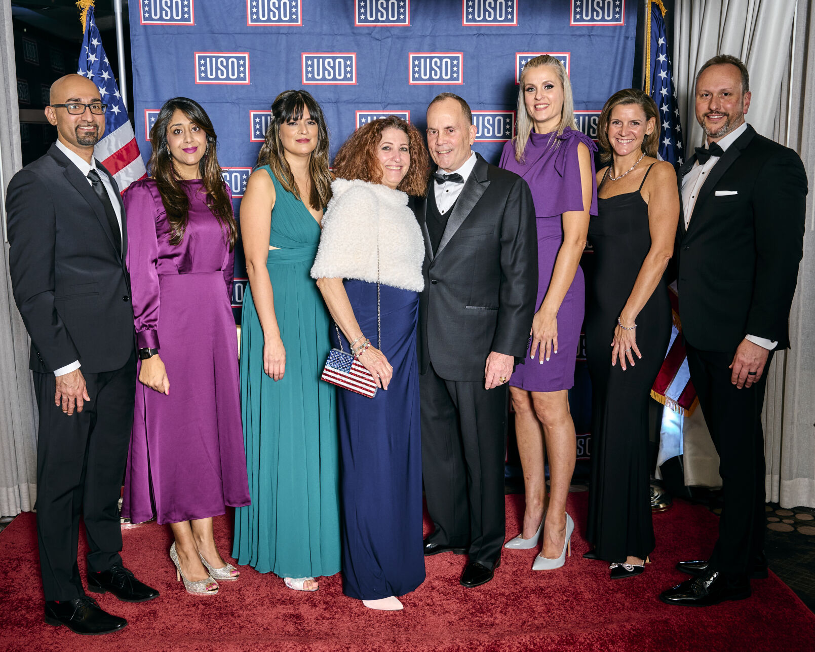 Beckie and Jim Evans (middle) with team from Sevan Multi-Site Solutions. (Photo courtesy of USO)